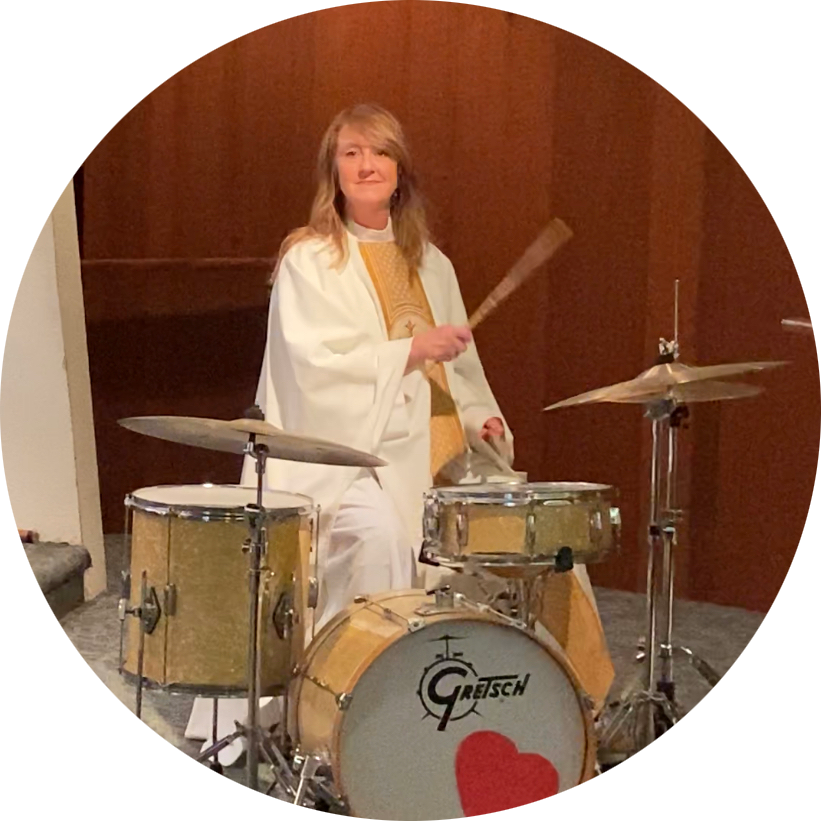 Rev. Lisa jams out on the drums because she is totally awesome!