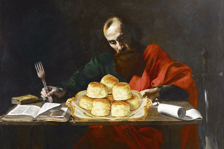 St. Paul stares down a plate full of biscuits