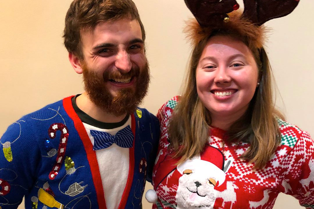 Two parishioners donned some wacky sweaters to win the tacky sweater award