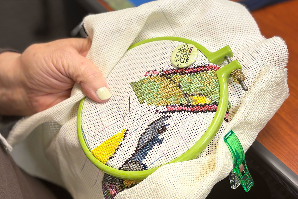 Everyone pitches in to make the burgers and bbq for the back-to-school Pentecost BBQ