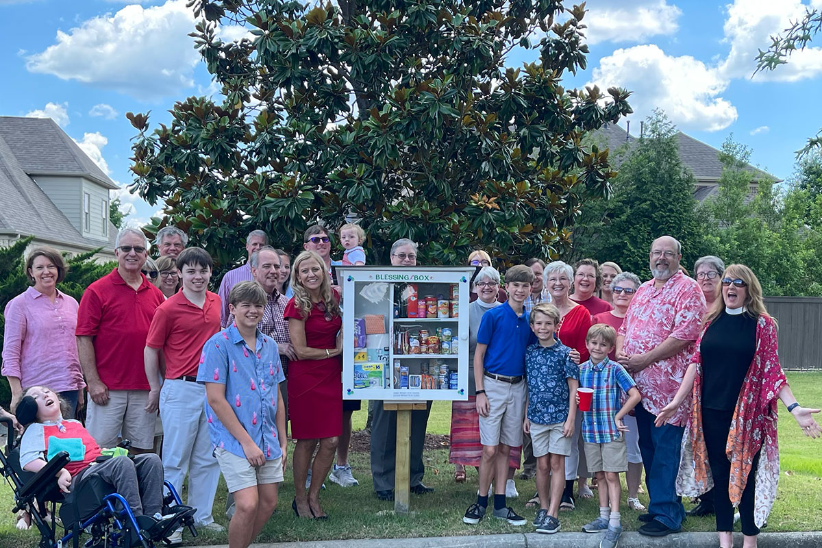 Parishioners enjoying chicken and waffles for Mardi Gras