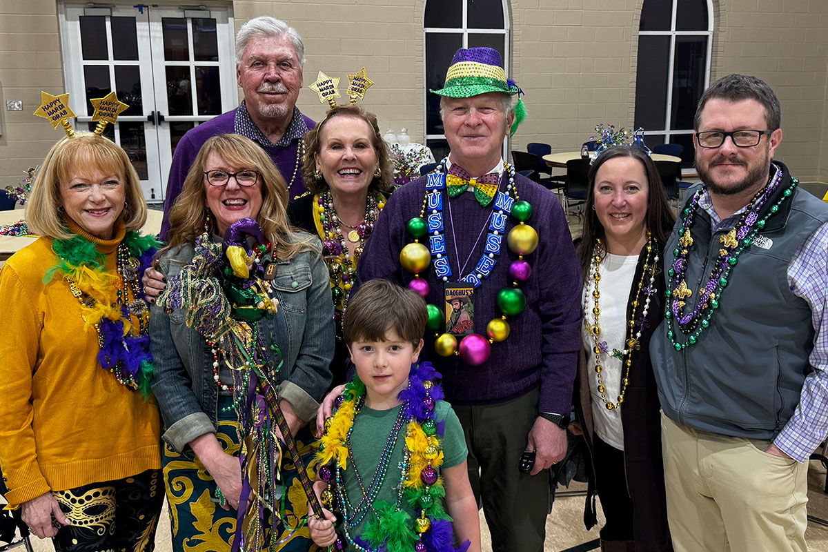 Parishioners enjoying chicken and waffles for Mardi Gras